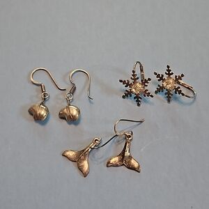 Three pairs silver earrings.